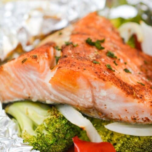 Keto air fryer salmon parcels with vegetables.