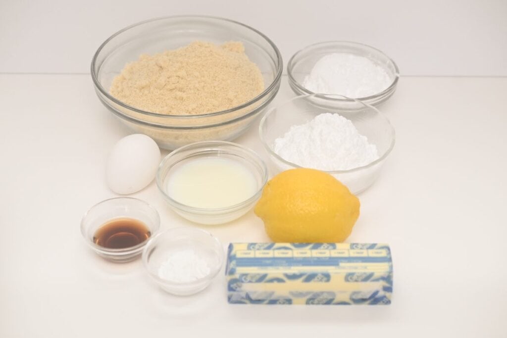 Ingredients for keto Italian lemon cookies including almond flour, Swerve sweetener, butter, lemon, egg, almond milk and vanilla.